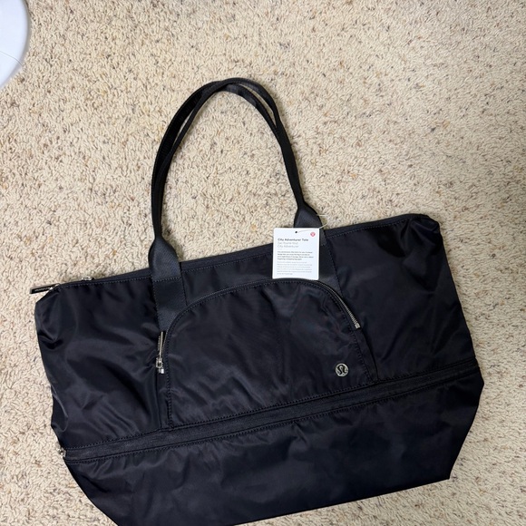 lululemon athletica Handbags - lululemon athletica Black Nylon Zip-Top Tote